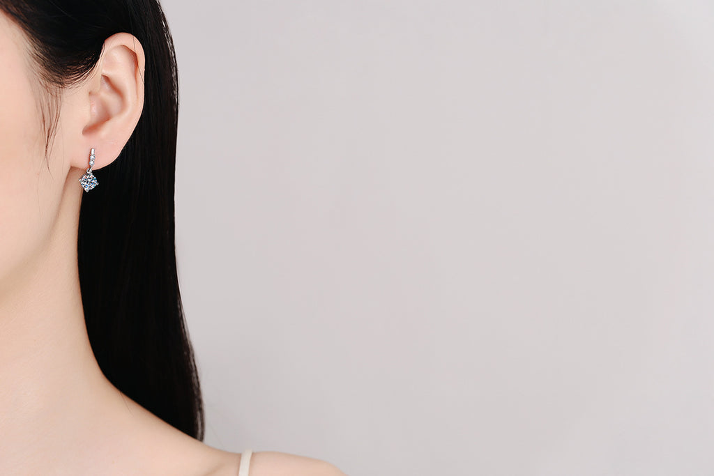 Pavé bar drop earrings on ear