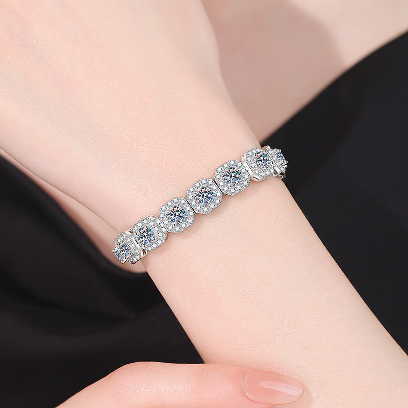 Moissanite link bracelet worn on wrist
