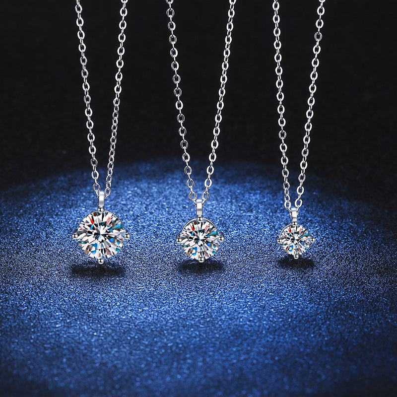 Four-prong moissanite necklace detail