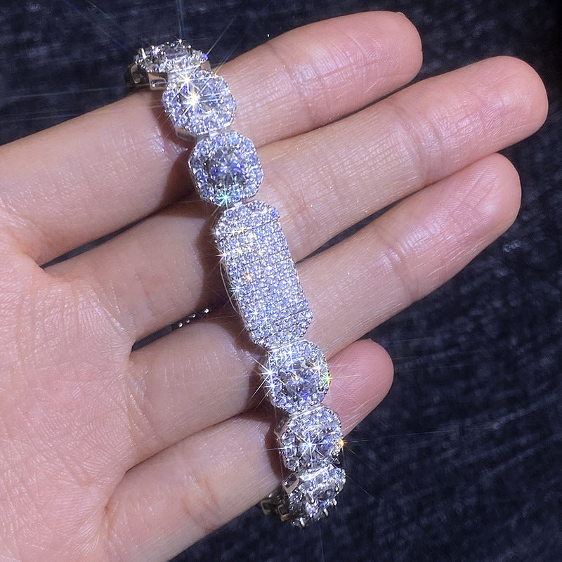 Iced moissanite bracelet in hand