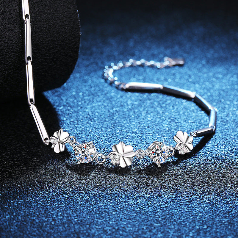 Four-leaf clover moissanite bracelet studio angle