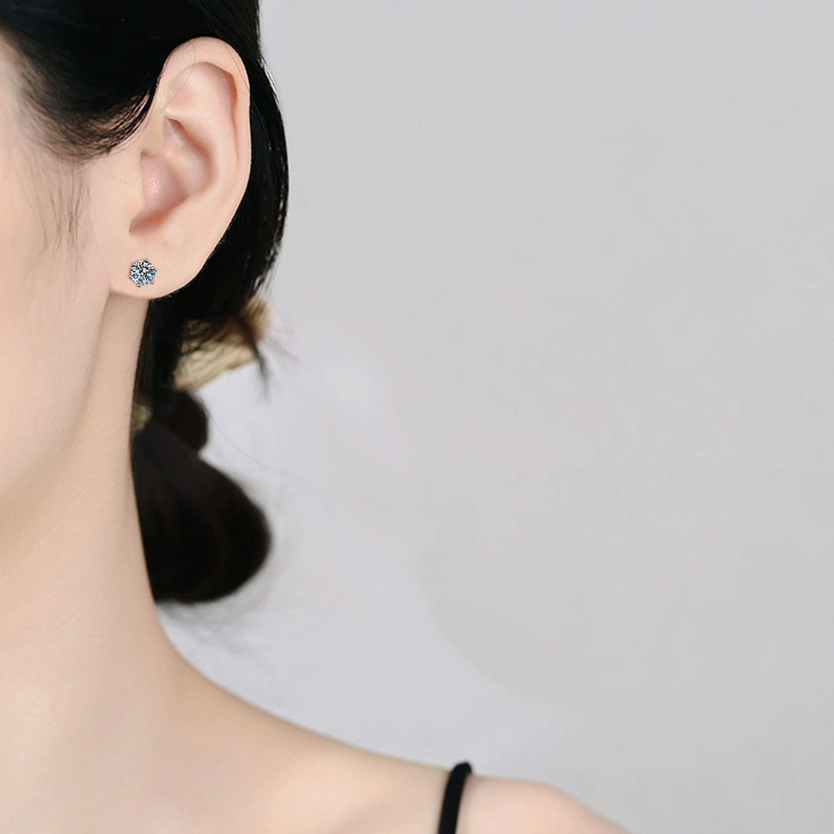 Six-prong moissanite studs angle