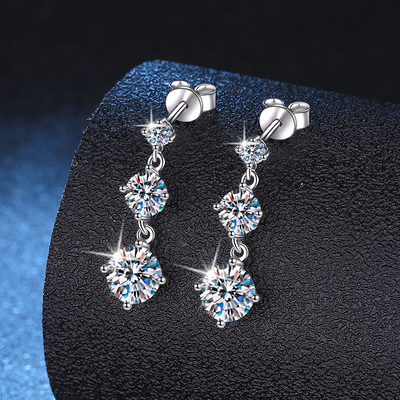 Moissanite three-stone drop earrings in sterling silver