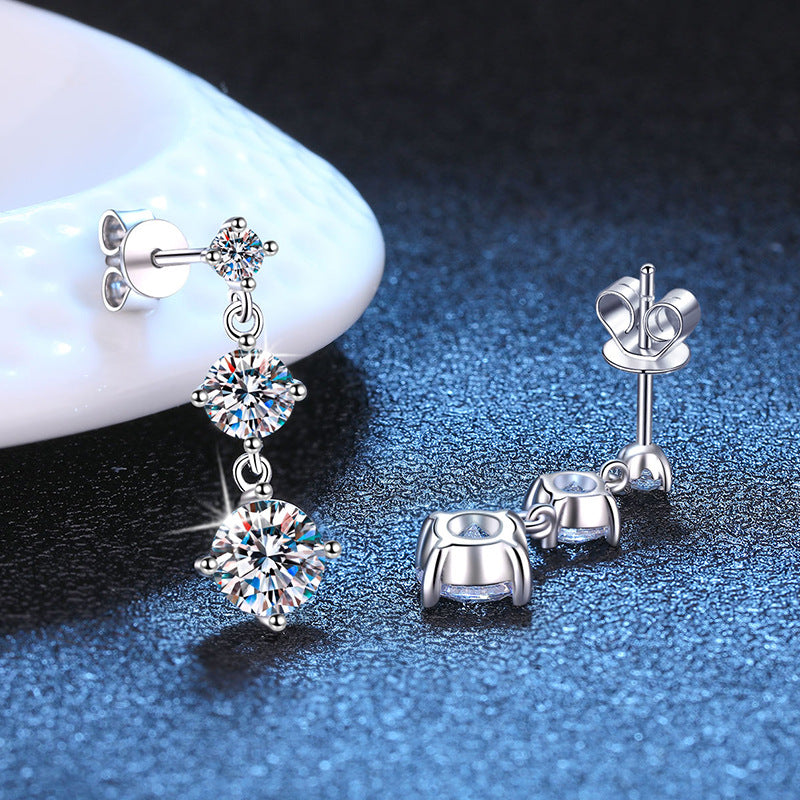 Moissanite three-stone drop earrings in sterling silver