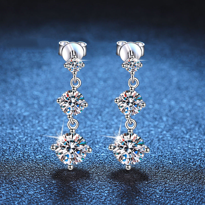 Moissanite three-stone drop earrings in sterling silver