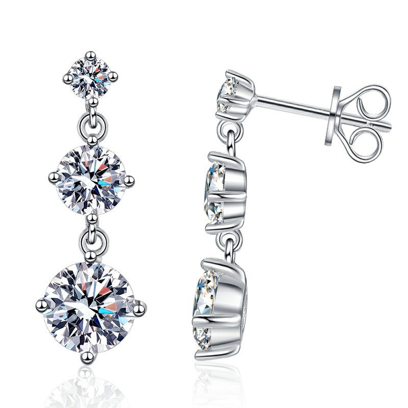Moissanite three-stone drop earrings in sterling silver