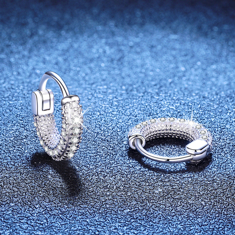 Moissanite huggie hoops showing hinged closure