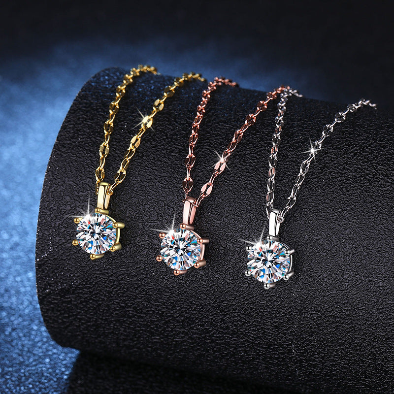Six-prong round moissanite solitaire pendant on sterling silver chain