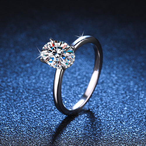 Oval moissanite solitaire ring in sterling silver, angled view