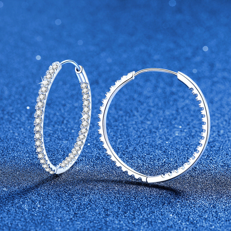 Full pavé moissanite earrings in sterling silver — detail view