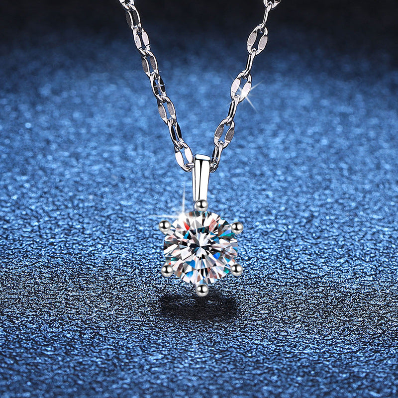 Six-prong moissanite solitaire necklace in platinum tone