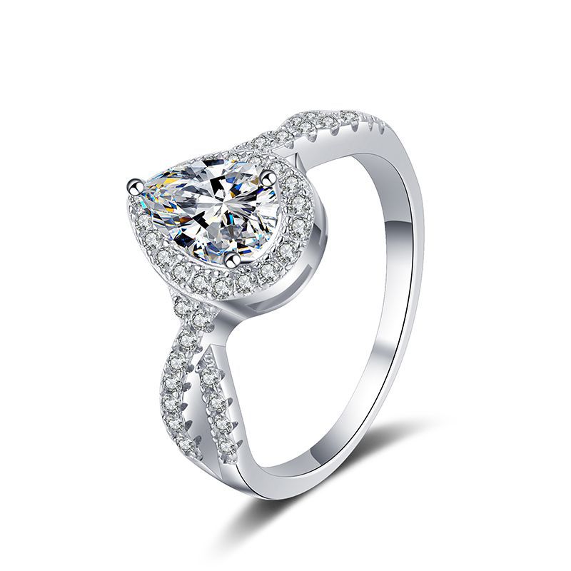 1ct teardrop moissanite halo ring white background