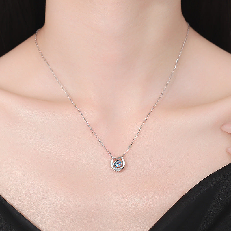 Model wearing the Aeterna Fine moissanite solitaire pendant necklace