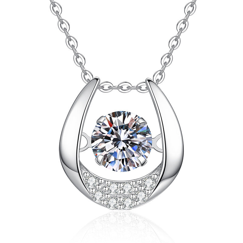 Close-up of the moissanite solitaire pendant on sterling silver chain