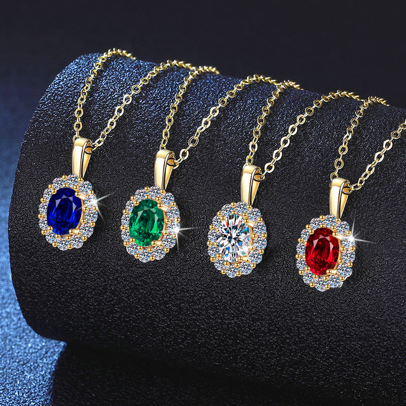 Oval halo pendant necklaces in sapphire, emerald, moissanite and ruby
